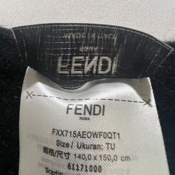 This is a Fendi shawl featuring the brand's iconic FF pattern. - Picture 7 of 8